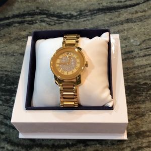 Movado gold/diamond watch. Perfect